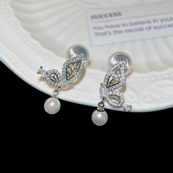 Silver Butterfly Elegance Pearl Drop Ear Clips