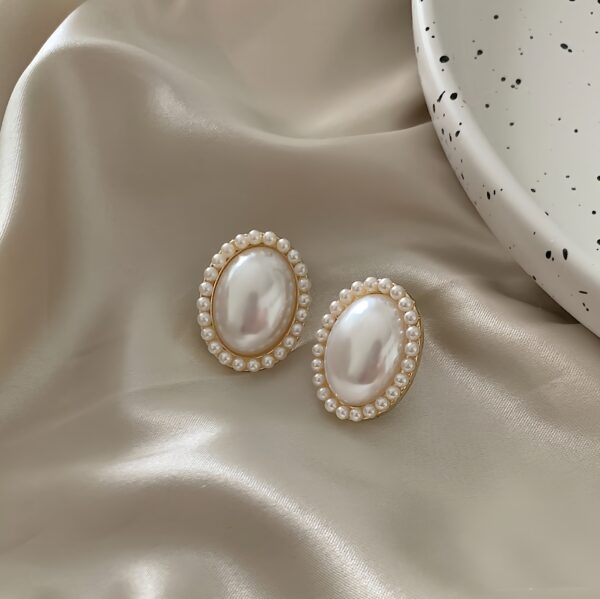 Elegant Oval Pearl and Ruby Ear Clip Set - Image 3